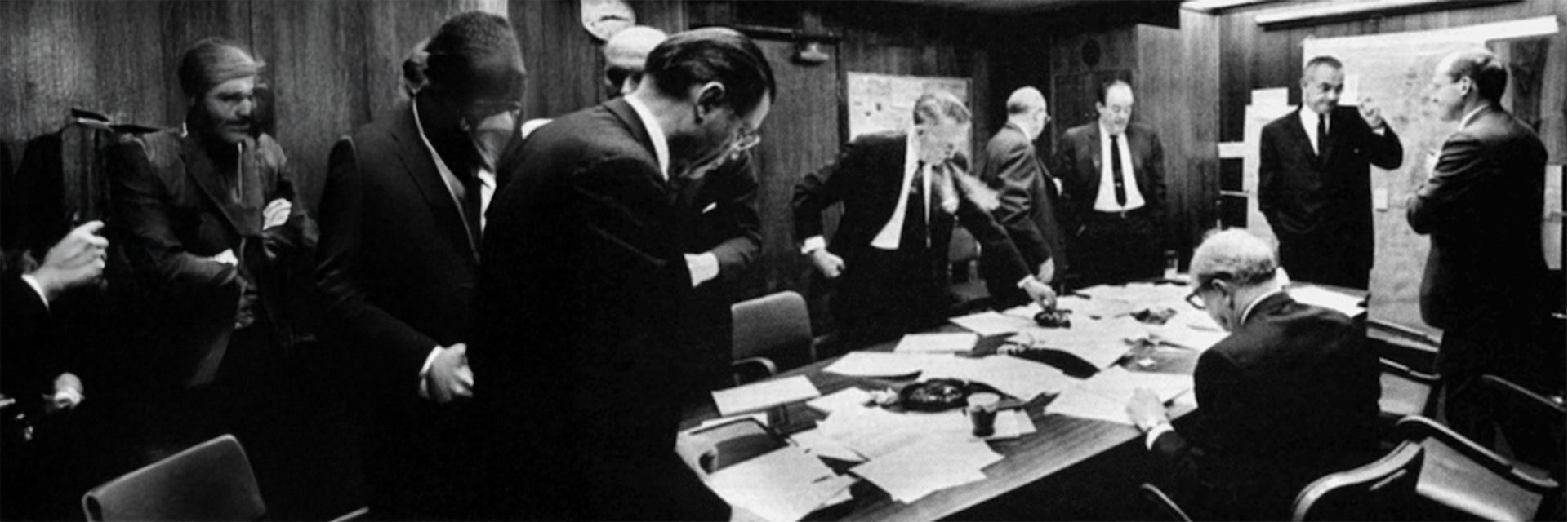 Black and white photo people in meeting room