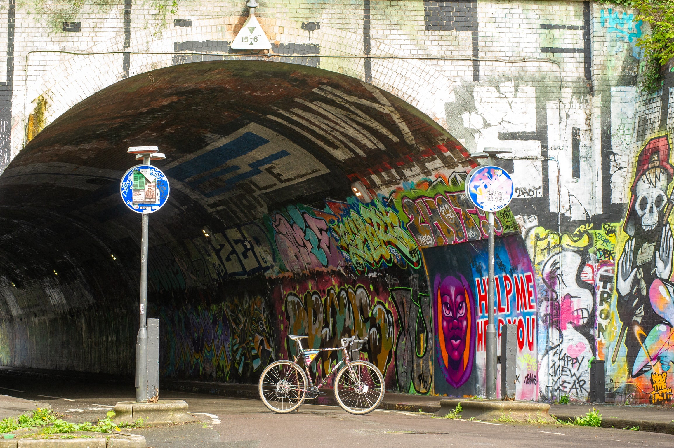 Custom Surly Preamble at distance on street next to tunnel