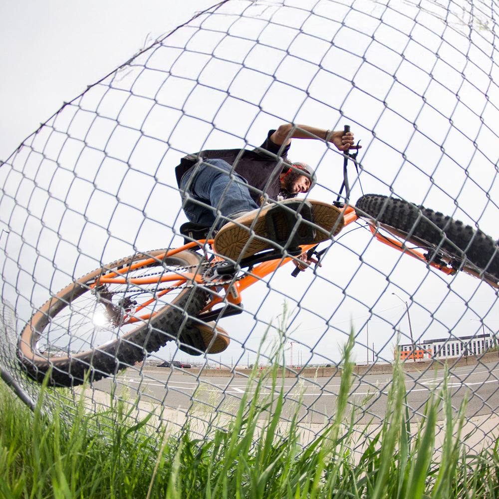 Person riding Surly Lowside fence wall ride
